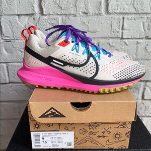 Nike Running Trail React Pegasus 4 trainers in stone and pink size 9
